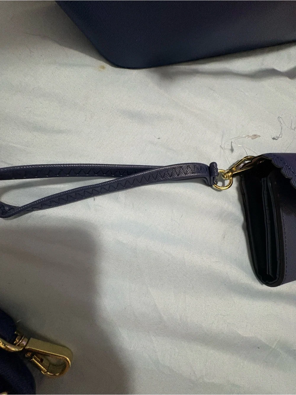 Structured Navy Fashion Tote with Gold Chain Accent and Wallet.